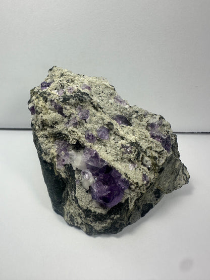 Purple Fluorite Clusters on Matrix