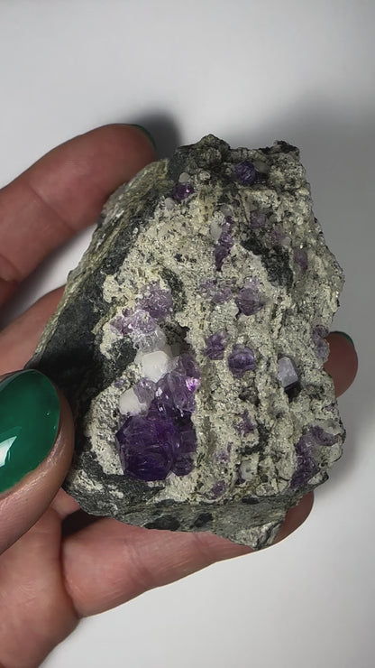 Purple Fluorite Clusters on Matrix